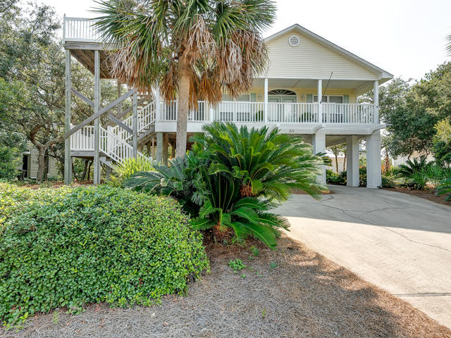 Coastal Dream the name speaks for itself. This charming coastal cottage has been recently updated in every way, new kitchen, new carpet and all new furniture. Gulf views from the viewing tower, a short walk to the beach and a private pool make this home a perfect beach getaway. Home can be used as a permanent private residence or great vacation rental. Living area, Master Bedroom and Guest Bedroom are on the second level. The 3rd bedroom is a completely separate apartment on the ground floor. Enjoy this great neighborhood without any HOA restrictions or fees. The backyard oasis features lush landscaping, fire pit and a private pool. The pool has new pavers and has just been resurfaced. This home is a must see to appreciate! Best value on the Beach! Minutes to Alys Beach and Rosemary.