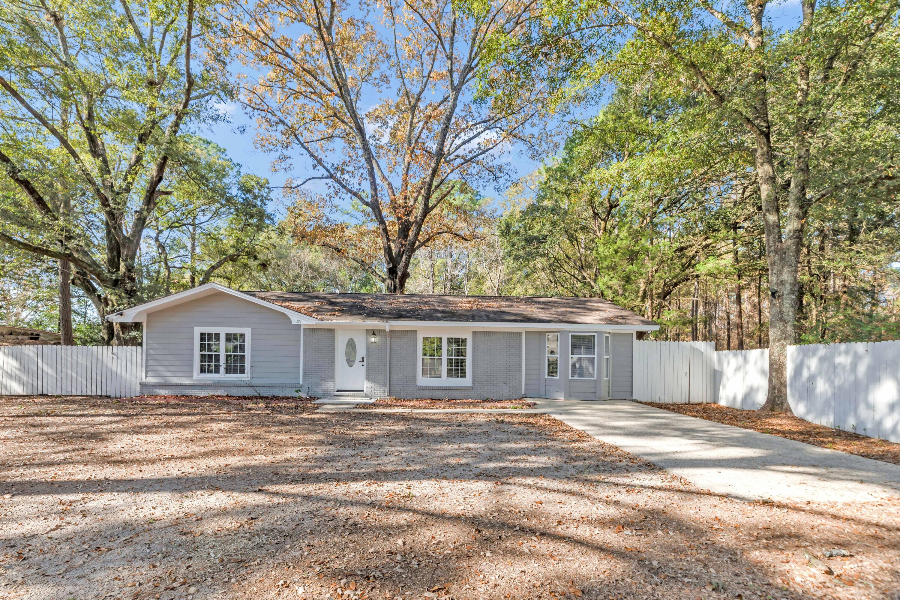 Welcome to 319 Jones Rd, a stunningly renovated home situated on a spacious 0.43-acre lot! This property boasts a remodel kitchen with granite countertops. The home has been freshly painted inside, offering a clean and modern feel. With NO HOA, you'll have the freedom to enjoy your property without additional fees or restrictions. The large lot provides ample space for outdoor activities, gardening, or even future expansions. Conveniently located near schools, shopping, and dining, this move-in-ready gem is ready to welcome its new owners. Schedule your showing today!