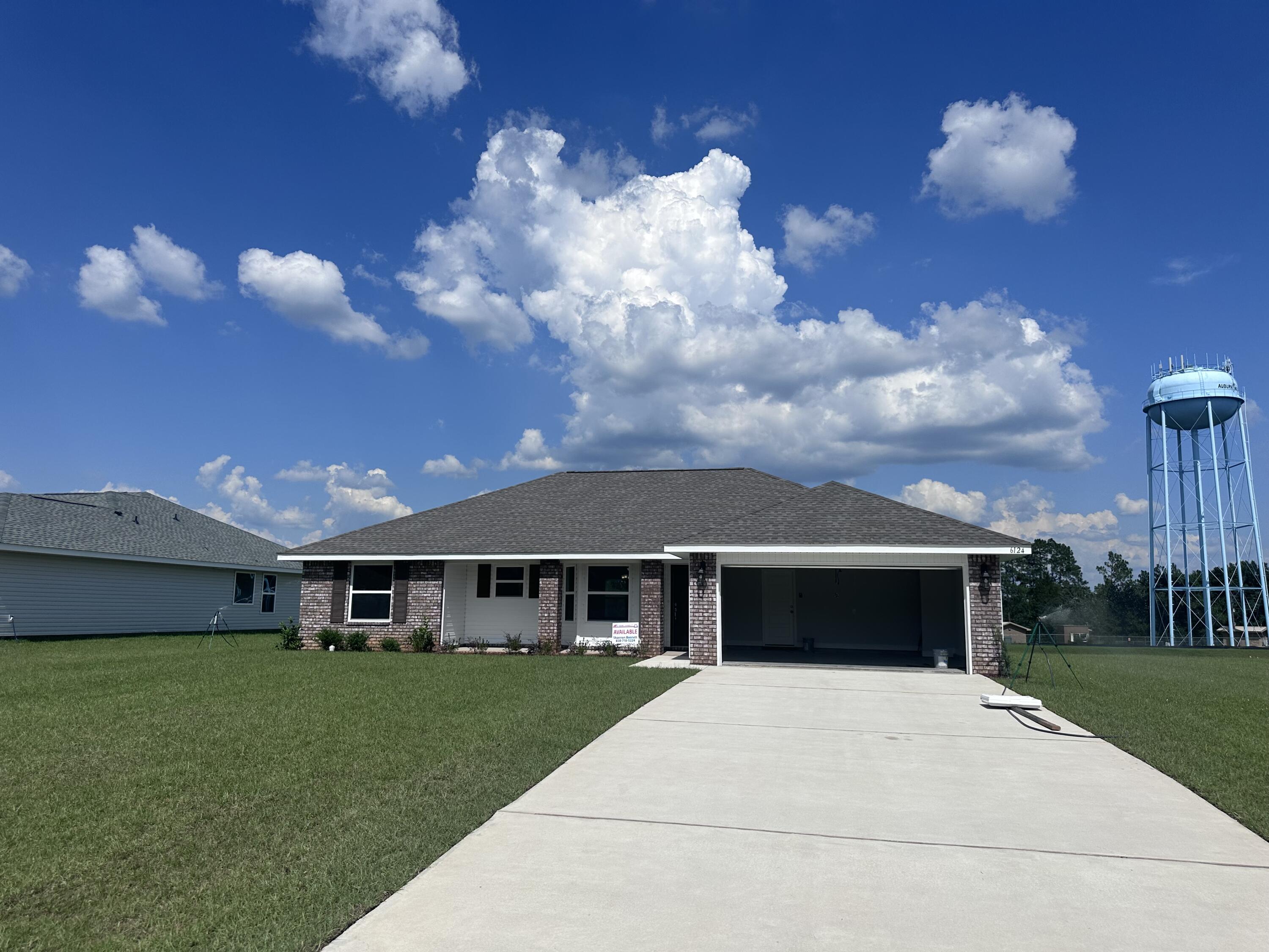 This 3/2 has so much to offer! Good sized lot fully sodded and comes with electric garage door opener. The house is 3-sided vinyl with a brick front with a large front porch. This is a split floor plan