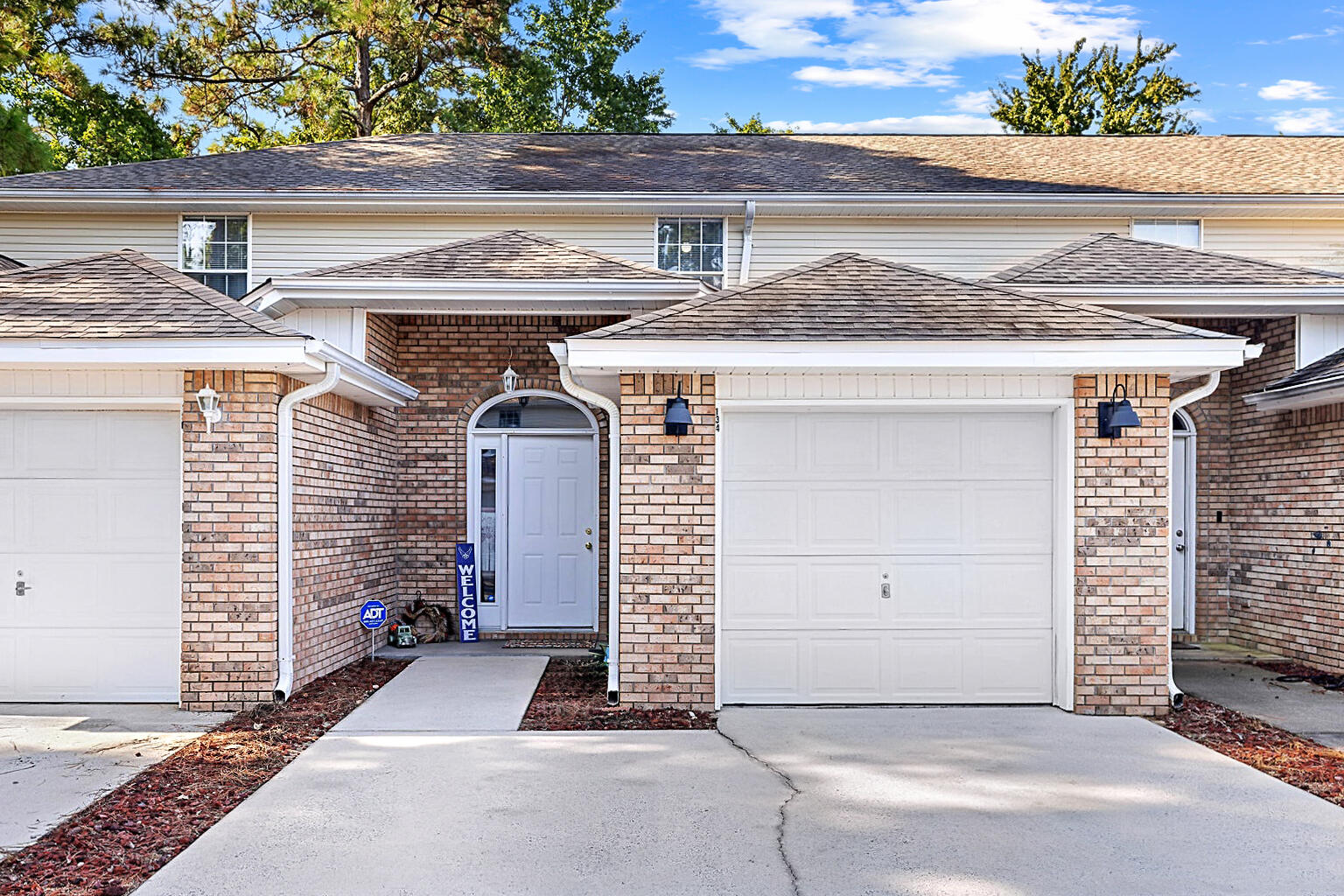 Discover the perfect blend of comfort and convenience in this well maintained 2 bedroom, 2.5 bath townhome. Step inside to an open, airy floor plan designed for modern living. Relax on your private deck with a fully fenced backyard, a serene escape after a long day.Inside, you'll find the ultimate in privacy and comfort with both bedrooms on the second floor featuring ensuite bathrooms. The added convenience of an in-home laundry room and a one-car garage make everyday life a breeze. Located just a short 6-mile commute from Hurlburt Field, this townhome offers the best of both worlds: a peaceful retreat and easy access to base amenities. Don't miss this opportunity to make it your own! Roof 2017, HVAC 2017 and Water Heater 2021.