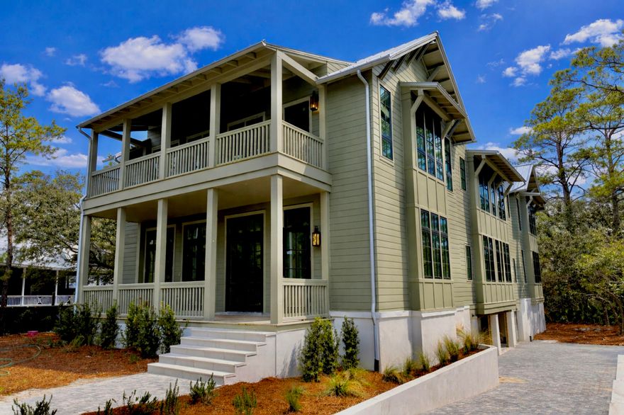 Experience the rare opportunity to own a brand-new, custom-built coastal masterpiece in the exclusive gated community of Lakeplace at Grayton Beach. Scheduled for completion in March 2026, this 5-bedroom, 5.5-bathroom home sits on nearly half an acre, blending timeless coastal elegance with modern luxury.Boasting 5,686 square feet of heated and cooled space and nearly 10,000 square feet under roof, this residence was thoughtfully designed for both refined living and effortless entertaining. The expansive outdoor area features a resort-style pool, spacious lounge, outdoor kitchen, and fire pit, creating the perfect setting for family gatherings or sunset entertaining. A three-car garage and oversized driveway offer ample parking for residents and guests alike. Inside, the grand living room welcomes you with vaulted ceilings, wood-beam accents, and a dramatic sense of space that flows seamlessly into the chef's kitchen. The kitchen is outfitted with Thermador appliances, quartz countertops, a walk-in pantry, and elegant additions such as a built-in wine cooler and coffee barperfect for everyday luxury or hosting.

The primary suite on the main level provides a serene retreat, featuring natural light-filled windows, painted nickel-gap ceilings, and a spa-inspired bathroom with dual vanities, an oversized walk-in shower, soaking tub, and marble flooring. The adjoining custom walk-in closet includes built-ins, a wall safe, and a convenient washer and dryer.

Take the elevator or stairs to the second floor, where you'll find four additional ensuite bedrooms, each with private or easy access to spacious outdoor patios. A second-floor laundry room and linen closet ensure ease and organization, while the open loft living area overlooks the grand living space below.

Nestled between Grayton Beach and WaterColor, Lakeplace at Grayton is a private, short-term rental-restricted community of only 50 homes, situated along a beautiful coastal dune lake. Enjoy community amenities including a dock and pool, and take advantage of easy walking or biking access to nearby restaurants, shops, and scenic 30A attractions.