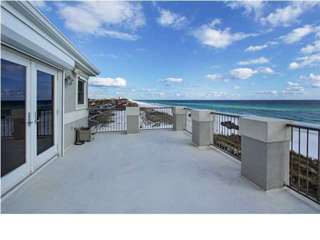 IMPECCABLE GULF-FRONT SHORT SALE This pristine and well-maintained 3 bedroom Gulf-front home in Destiny Shores has deluxe upgrades at every turn. High ceilings adorned with crown molding, a gourmet kitchen equipped with high-end appliances and morning kitchens in the master bedroom and guest suite enhance the luxurious yet comfortably livable feel of the home. Guests will be inspired by the impressive 2-story grand entrance. Spectacular views of the Gulf fill the living/dining area and can also be enjoyed from any of the home's three balconies. A gas fireplace surrounded by built-in shelving and storage cabinets provides a strong focal point in the living room. The impressive kitchen features high-end appliances, a large granite island with breakfast bar, custom built cabinetry and