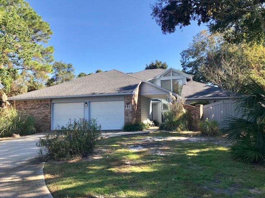 FURTHER PRICE ADJUSTMENT! BRING ALL OFFERS. This 2820-SF, 4 bedroom, 3 bath home situated on the 5th fairway of Indian Bayou Golf Course offers a peaceful and serene setting to call Destin home! Lowest price point to be in the popular residential neighborhood of Indian Bayou.The open floor plan is bright and airy with over 2800+ square feet of heated and cooled interior space, oversized 2-car garage with workshop area, and additional covered screened porch room overlooking the golf course. The ground level includes a Master Suite with private courtyard on the front elevation, in addition to a second bedroom/flex room/office with adjacent full bath. Two further bedrooms and full bath upstairs, with views from the open landing overlooking the Living Room, Dining Area and Foyer below.