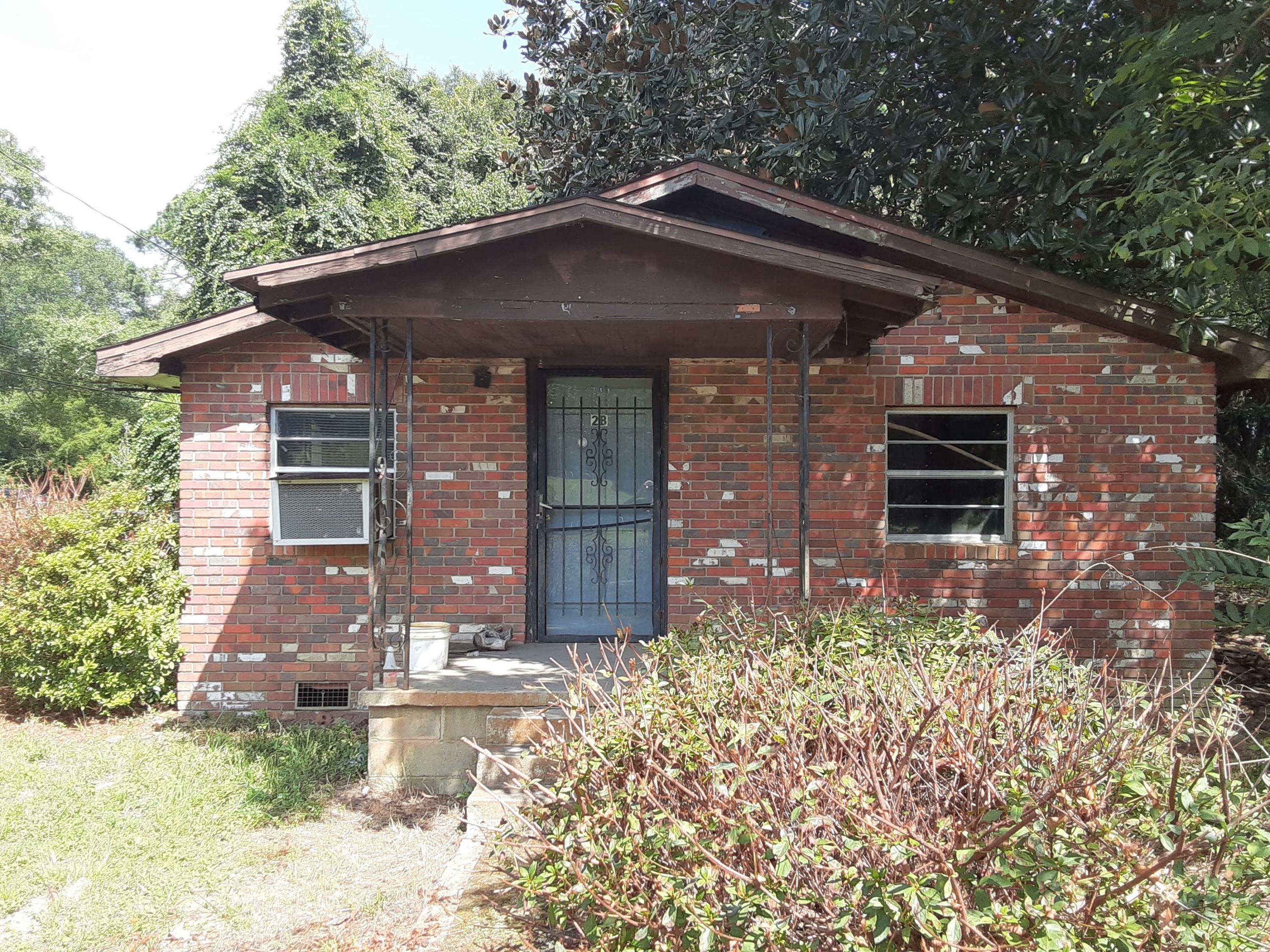 GOOD LOCATION. JUST MINUTES TO I-10, JUST OFF HWY 85 & MINUTES TO HWY 90. If you need a standard loan, this house is not for you. It will need work before it would qualify for a regular loan. Seller wants to sell ''As Is'' and is looking for cash offers. The home sits on 3 lots and this opens up additional possibilities. Check with Zoning...you might could do a renovation for the house, and also do a lot split for an additional home.