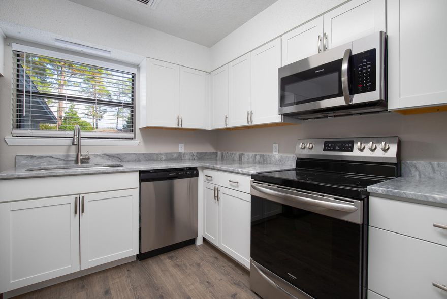 Welcome Home! This home boasts all the upgrades you could want from full interior and exterior paint, to new kitchen cabinets, appliances, and quartzite. New Roof, New flooring, light fixtures and the list goes on. Home also comes with a home warranty of your choice for up to $450. Call today to set up a showing.