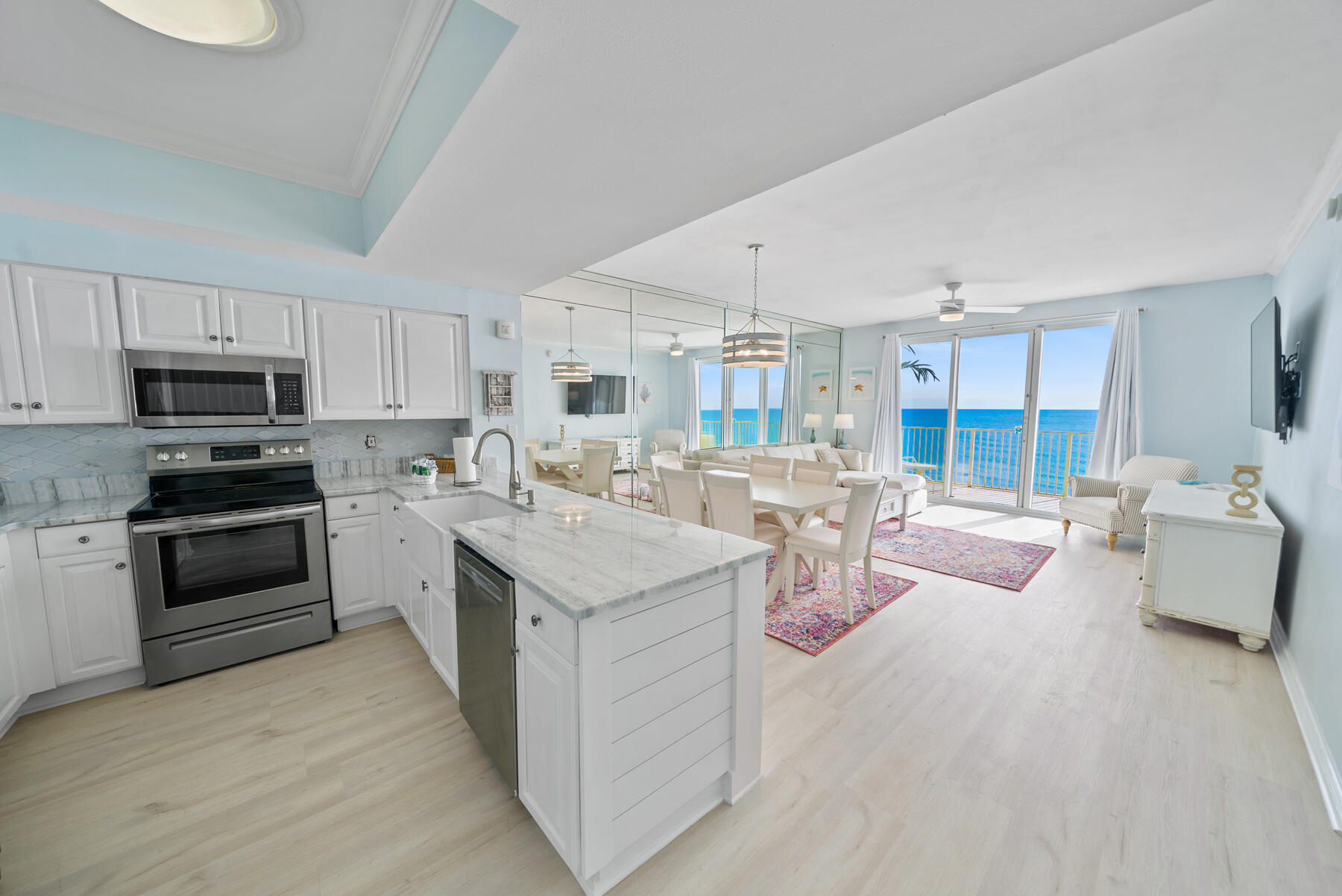 Experience coastal luxury at Majestic Sun B1109, a beautifully renovated 2-bedroom, 2-bath gulf-front condo nestled within the exclusive, gated Seascape Resort. Perched on the 11th floor, this stunning residence showcases panoramic views of the shimmering emerald waters and sugar-white sands from a spacious private balcony. Inside, the open-concept layout is filled with natural light and features a modern kitchen with granite countertops, stainless steel appliances, and chic coastal finishes throughout. The serene primary suite offers a king bed, en-suite bath, and direct balcony access, while the guest bedroom includes a twin-over-full bunk and access to a full hall bath. Enjoy world-class amenities including a heated indoor/outdoor pool, oceanfront hot tubs, state-of-the-art fitness center, tennis courts, championship golf, and 2,000 feet of pristine private beach. Perfect as a high-performing rental or a dreamy personal retreat by the sea.