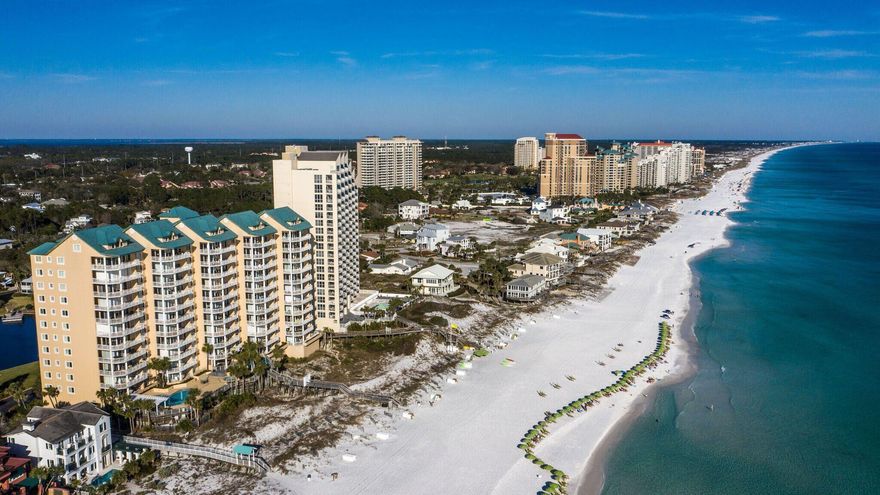 LUXURY GULF FRONT CONDO*** RARE OPPORTUNITY ON THE 7 TH FLOOR IN THE COVETED 20 STACK OVERLOOKING THE DUNES *** PRIVATE NON-RENTAL BUILDING***STUNNING PANORAMIC VIEWS***EXPANSIVE WRAP-AROUND BALCONY WITH BUILT- IN GAS GRILL*** FULLY FURNISHED***RARELY DO THESE EXQUISITE HIGHLY COVETED, PRIVATE, GRAND VILLAS RESIDENCES COME ON THE MARKET. THE GRAND VILLAS BUILDING IS TRUE QUALITY AT ITS FINEST! GRAND VILLAS IS A NON-RENTAL BUILDING PROVIDING PRIVACY AND SECURITY WITH A SEPARATE SECURITY GATE, PARKING AND PRIVATE AMENITIES INCLUDING A PRIVATE GULF FRONT POOL AND SPA SURROUNDED BY EXPANSIVE DECKS WITH AN ENTERTAINMENT BAR COMPLETE WITH ICE MAKER AND A BEAUTIFUL WALKWAY TO THE DEEDED BEACH. A CONVENIENT WALK-WAY LEADS DIRECTLY TO THE PRIVATE DEEDED BEACH WITH  CHAIR AND UMBRELLA SERVICE.
THIS NON-RENTAL COMMUNITY INCLUDES PRIVATE SECURITY AND A FITNESS CENTER. THERE IS ALSO A GRAND VILLAS COMMUNITY LOBBY AND LAKESIDE FIREPIT AVAILABLE FOR YOUR SOCIAL EVENTS. NEVER WORRY ABOUT PARKING YOU WILL ENJOY THE PRIVATE COVERED PARKING FOR GRAND VILLAS RESIDENTS ONLY.
THE SPECTACULAR GULF VIEWS ACROSS THE ENTIRE BACK OF THIS 7TH FLOOR CONDO.  WELCOME YOU TO THIS LOVELY CONDO. STEP OUT THE DOUBLE SLIDING GLASS DOORS TO THE EXPANSIVE BALCONY WITH YOUR OWN COOKING SPACE INCLUDING A BUILT- IN GAS GRILL, BREAKFAST BAR CONVENIENTLY ACCESSIBLE BY THE KITCHEN WINDOW THAT SLIDES OPEN LIKE A BALCONY DOOR, MAKING IT EASY TO PASS FOOD AND COOKWARE BACK AND FORTH. LOCATED IN THE FABULOUS HIDDEN DUNES BEACH AND TENNIS RESORT. HIDDEN DUNES IS KNOWN FOR THE VIEWS... NO WORRIES IF CUSTOMARY USE IS DECLARED IN WALTON COUNTY ! THE RESORT IS FLANKED ON BOTH SIDES BY SINGLE FAMILY HOMES WITH GATED ACCESS.  THERE ARE NO TOWERS TO OBSTRUCT YOUR VIEW ALLOWING FOR INCREDIBLE VIEWS FROM YOUR LIVING ROOM, KITCHEN, AND MASTER SUITE AND BALCONY. YOU WILL SEE THE SUN RISE, THE DOLPHINS PLAYING, THE SUN SETTING, AND THE SEASONAL FIREWORKS SHOW ALL FROM YOUR LARGE PRIVATE   BALCONY. THE LOCATION IN THE BUILDING IS IDEALLY SITUATED ON THE 7TH FLOOR IN THE VERY DESIRABLE 20 STACK WHICH IS THE SECOND UNIT FROM THE EASTERN CORNER OF THE BUILDING ENSURING FOREVER VIEWS OF THE GULF.
THE MAIN LIVING AREAS INCLUDING THE BALCONY ALL HAVE TILE FLOORS.    
THE LIVING, DINING & KITCHEN AREA FLOW SEAMLESSLY TOGETHER. THE KITCHEN HAS  , BEAUTIFUL GRANITE COUNTERTOPS, WHITE CABINETS AND STAINLESS STEEL APPLIANCES (EXCEPT DISWASHER)  THE SPLIT FLOOR PLAN IS PERFECT FOR PRIVACY WITH THE MASTER SUITE OFF THE MAIN LIVING AREA.
YOU WILL WAKE EACH MORNING IN THE MASTER SUITE THAT BOASTS A WALL OF WINDOWS TO FRAME THE DRAMATIC VIEW OF THE GULF. CLOSETS GALORE YOU HAVE TWO SPACIOUS WALK-IN CLOSET, THE UPDATED EN-SUITE HAS A RELAXING TUB, WALKIN SHOWER, AND DOUBLE VANITIES. ACROSS THE LIVING AREA THERE ARE 2 GUEST BEDROOMS AND 2 BATHS . YOU WILL ALSO ENJOY A SEPARATE LAUNDRY ROOM, AND A SPACIOUS CLOSET IS JUST OUTSIDE YOUR FRONT DOOR FOR ADDITIONAL STORAGE.   

HIDDEN DUNES IS A LOW DENSITY, GATED, BEACH FRONT RESORT CONSISTING OF 27 MANICURED ACRES WITH AN ABUNDANCE OF MANICURED MATURE NATURAL VEGETATION, WALKING PATHS, LIGHTED FOUNTAINS AND POOLS. THIS BEACHFRONT DEVELOPMENT OFFERS A PROFESSIONAL TENNIS FACILITY WITH 6 RUBICO COURTS AND A PRO-SHOP, IN SEASON TRAM SERVICE, LIGHTED BASKETBALL COURT AND PICKLE BALL COURT, HORSESHOE PITS, 4 POOLS, 4 HOT TUBS, BB GRILLS, WORKOUT FACILITY, AND 24 HOUR SECURITY. HIDDEN DUNES OFFERS A PRIVATE BEACH WITH SEASONAL BEACH SERVICE. HIDDEN DUNES IS RECOGNIZED AS ONE OF THE MOST FINANCIALLY STRONG HOA'S IN NW FLORIDA.
THIS WILL SELL QUICKLY HURRY TO MAKE YOUR LIFETIME MEMORIES WITH YOUR FAMILY AND FRIENDS ON THE QUIET SUGAR SAND BEACHES OF GRAND VILLAS AT HIDDEN DUNES.

