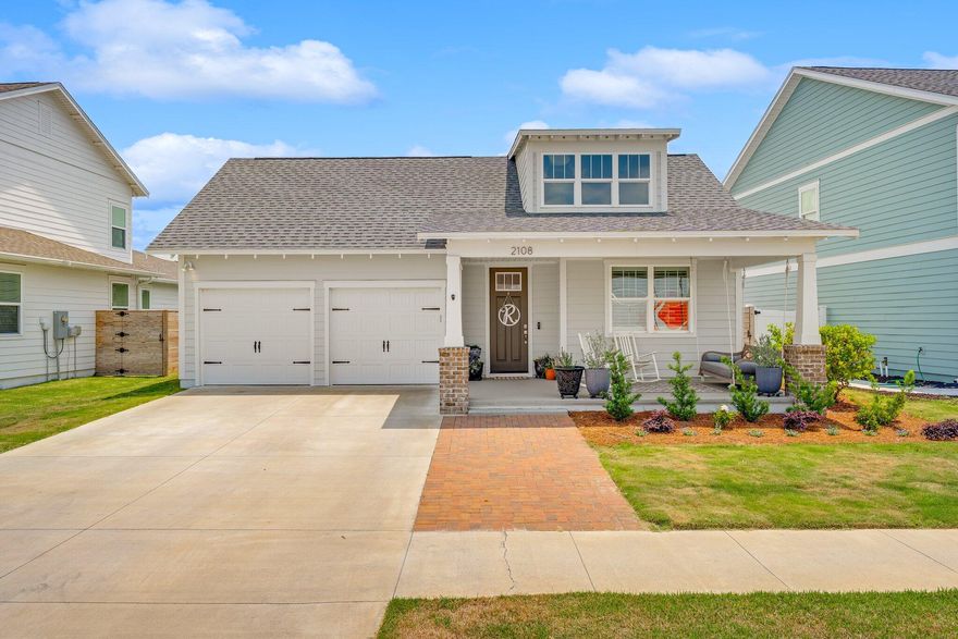 Welcome to 2108 Royal Tern Street, a beautifully crafted Harris Doyle home nestled in the sought-after SweetBay community. This Clearwater floor plan features 3 bedrooms, 2 bathrooms, and offers refined coastal living with thoughtful upgrades throughout. One unique highlight of this home is its location as no street parking is allowed directly in front, providing added privacy. It is also positioned next to a lush green space, offering a serene view from the front porch swing. Inside, the flexible layout includes two living areas, ideal for a home office, dining room, or additional family space. Elegant coastal-inspired design elements include light walnut luxury vinyl plank (LVP) flooring, brushed nickel hardware, and stylish lighting fixtures. The home also includes custom blinds throughout and plantation shutters on the front windows to provide added privacy.  

The kitchen seamlessly connects to the main living area and is a true centerpiece, showcasing Artic white quartz countertops, stone gray cabinetry, white backsplash, decorative wood hood, slide-in gas range, large island with seating, stainless steel single-bowl sink, built-in microwave, and under-cabinet lighting. 

The spacious primary suite overlooks the fully fenced backyard and features an ensuite bathroom with Infinity Calacatta ceramic tile flooring, zero-entry floor-to-ceiling tiled shower, double quartz vanity, stone gray cabinetry, and walk-in closet. The main living area showcases a sophisticated fireplace and offers seamless indoor-outdoor living with 6' sliding glass doors leading to the backyard. Step into your private, fully fenced retreat, where a covered back porch sets the stage for refined entertaining, elevated al fresco dining, or watching the game in comfort and style with guests. 

Located in SweetBay, this vibrant waterfront community offers over 5 miles of bayfront shoreline, two resort-style pools, basketball court, walking trails, playgrounds, and ample green space. The neighborhood also features the highly rated University Academy (Preschool-8th Grade), and a golf cart-friendly lifestyle. SweetBay is also home to its own Town Center, featuring a Publix, Starbucks, and plans for additional dining and retail options. Plans are also underway for an 11-acre marina with over 100 wet slips and 250+ dry boat storage. Don't miss this opportunity and schedule your private tour today.
