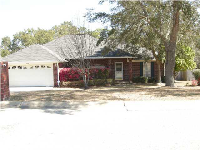 Short sale. Restful quietude... Beautiful home and yard near Holley by the Sea and Hidden Creek golf course. Living room has cathedral ceilings and corner fireplace with large mirror. Formal dining area is open to the living room for a spacious feel. Split bedrooms. Master bedroom has tray ceiling. Master bath has whirlpool tub with tile step up, separate shower, and double vanities. Separate walk-in closets in master bath. Roof was replaced in 2004. Screen back porch looks out on a gorgeous shaded lot. Peaceful... ahhhh. Buyer to verify all data. Square footage source: Santa Rosa County property appraiser website and lot size source: seller's survey. Buyer to rely solely on own appraisal for square footage and own survey for lot size.