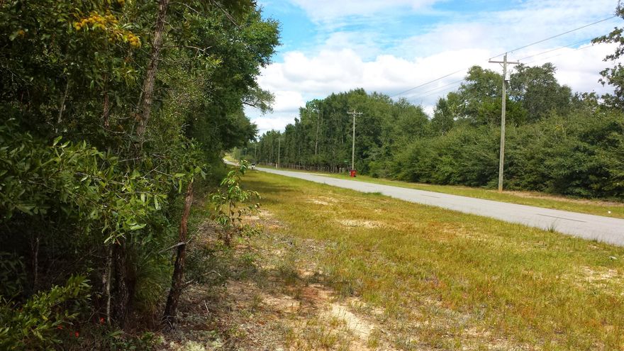 1.27 acre on paved road. Parcel is level, and dry.