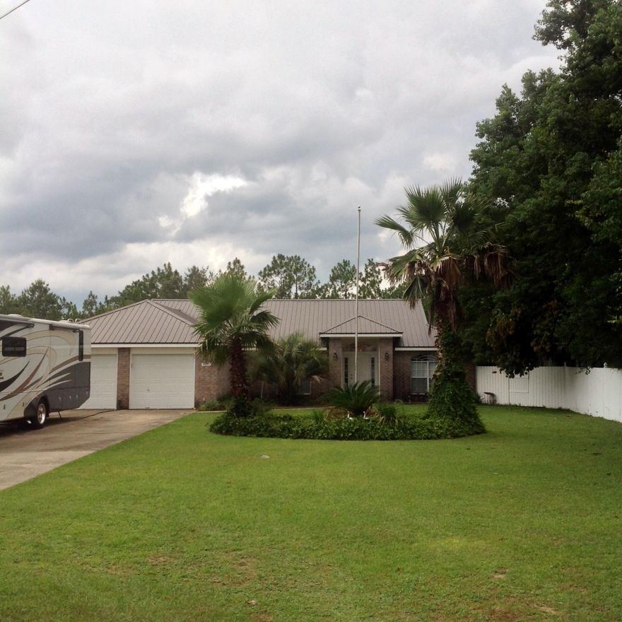 You're going to LOVE this Beautifully maintained, remodeled Pool Home on the South end of Crestview! Situated on a HALF ACRE lot, this all brick home has extended parking for RV, boat or more! Cheerful foyer welcomes you into the Living room with vaulted ceiling, Fire place, Dining Area, and wait until you see the Kitchen! $25,000 Kitchen remodel just completed! The cook will be in heaven here! Split floor plan features Master bedroom with newly remodeled $6,000 bathroom. Double vanities, tiled floors, garden tub and shower with seat are included. 2 more bedrooms and full bath are on opposite side of home. A large screened porch opens to an additional screened in, heated, gunite pool and spa! Yard is HUGE and has deep well for sprinkling or drinking! This water is pure! SO much to love!