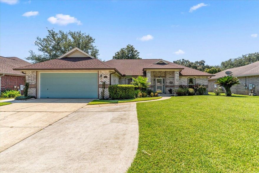 This beautifully maintained 3-bedroom, 2-bath all-brick home offers exceptional curb appeal and a manicured backyard, making it move-in ready inside and out. The bright, open floor plan features fresh neutral paint, newly installed  upgrades, including ceiling fans, modern lighting, and carpet in the two guest bedrooms. The spacious living area is highlighted by an electric fireplace with stonework, creating a warm and inviting focal point. The kitchen includes appliances less than four years old, a new backsplash, and updated faucets. A fully enclosed, climate controlled Florida room provides year-round enjoyment and adds flexible living space. Peace of mind comes with numerous key updates: new roof (2020), HVAC system (2020), water heater (2021) windows (2025) and tons more!