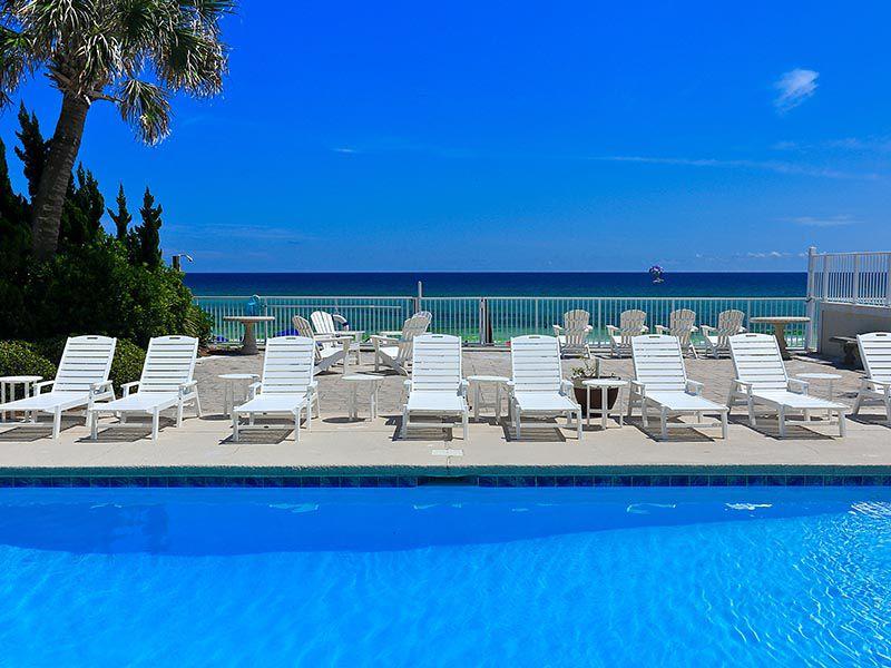 Just reduced almost $100,000!!! This Gulf-front vacation rental machine is comprised of two units, which can be rented individually or as one 9-bedroom home! Many recently renovations, a full size pool with a huge deck, balconies overlooking the Gulf and room to sleep 30, make it an ideal site for weddings and family reunions. It's one of only a very few beach homes along the coast to have a protective seawall. The A side of this home offers 4, double-bunk beds a bedroom and a full kitchen and like its own separate suite. The B side also has a bunk room and full kitchen as well. The master bedrooms on both sides have a sitting room, with ample room to add more sleeping quarters if necessary. Buyer to verify all dimensions