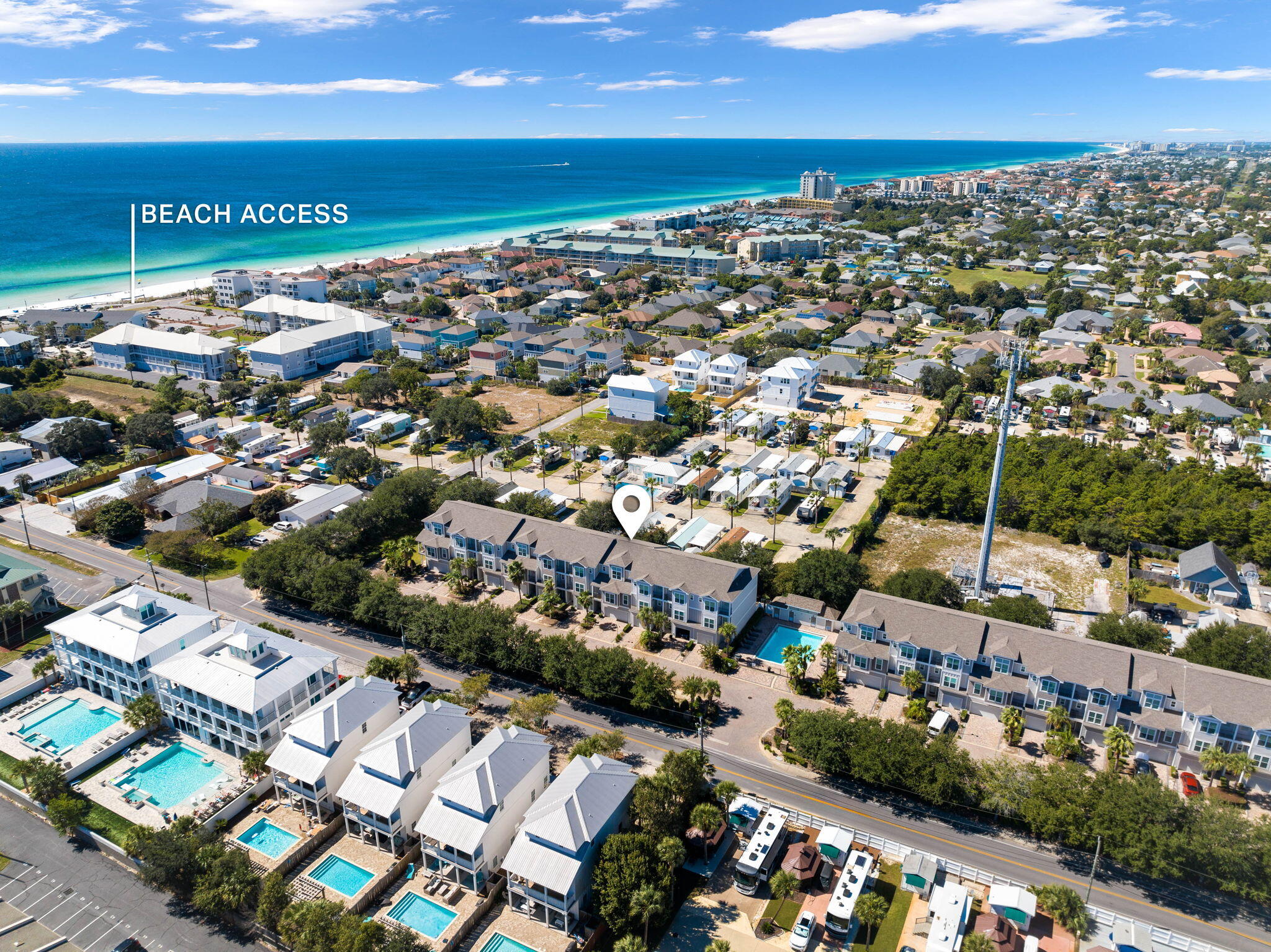 Discover the perfect marriage of luxury, space and location at Driftwood 14, a stunning three-story townhome in Miramar Beach. Nestled in the sought-after Driftwood Drive community, this meticulously designed five-bedroom, four-bathroom retreat spans 2,610 square feet and comfortably accommodates up to 14 guests. Built in 2017, this elegant home is ideally situated just 700 feet from the beach and the iconic Pompano Joe's, offering unparalleled access to Miramar Beach's vibrant dining, shopping and entertainment scene. Step into a home that exudes quality and sophistication, featuring real oak hardwood floors, granite countertops, stainless Frigidaire Gallery appliances and crown molding throughout. The entrance level welcomes you with a serene king bedroom with patio access, a charming bunk room with four twin beds, a shared bath and a convenient laundry area. On the second level, an open-concept living area seamlessly connects to the gourmet kitchen, where granite counters, a spacious island and farm table seating await. The stylish living room, with ample seating and a 60-in. smart TV opens to a private balcony, perfect for enjoying coastal breezes. A queen bedroom with a Juliette balcony and shared bath complete this floor. The third level boasts a luxurious king master suite with a designer bathroom, oversized shower, soaking tub, and generous walk-in closet. An additional queen bedroom with a private bath and second laundry area provides ultimate convenience. With its two-car garage (including space for a golf cart), ample parking for up to four vehicles, and fiber cement board siding, this home is built for both comfort and durability. The community's amenities include a sparkling pool with nearby bathrooms, adding to the allure of this exceptional property. Whether you're seeking a primary residence, a second home or a lucrative vacation rental investment, Driftwood 14 offers unparalleled value. With rental projections in excess of $89K+, low HOA dues and proximity to the sugar-white sands of the gulf, this home is an opportunity not to be missed.