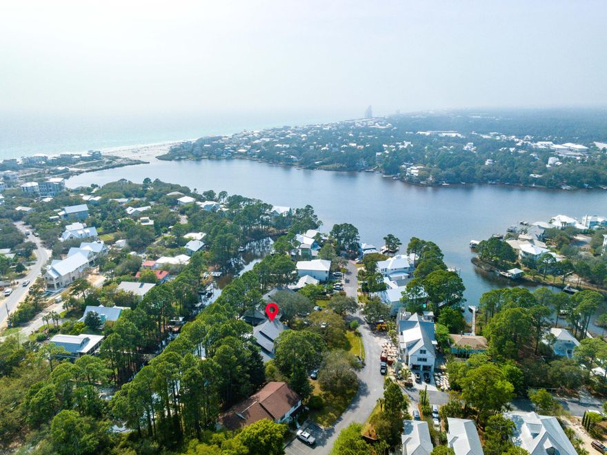 THIS IS IT! The one you have been waiting for! Fully remodeled interior with luxurious finishes, this property has it all! PRIVATE Dock on Eastern Lake where you can paddle or boat right over to the beach! Waterfront, South of 30A, and at this price, its the DREAM COME TRUE! Lakewood Townhomes recently underwent expansive exterior renovations as well including paint, doors, and a brand new metal roof! Seller has paid assessment in full! You get to enjoy the benefits! The kitchen features high end appliances including a 36' Commercial electric range/oven and VIEWS of Eastern Lake! The living room has a beautiful glass front gas fireplace and room to entertain! Master Suite encompasses the entire 2nd floor. Closet is giant and would make an excellent bunk room if buying as an investment.