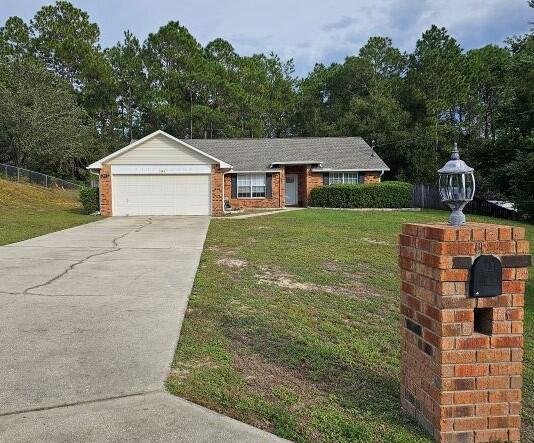 AVAILABLE 09/05/2025- Beautiful brick 3 bedroom 2 bath home nestled on a quiet cul-de sac on the south end of Crestview. Interior has fresh paint, new LVP flooring, raised ceilings, split floor plan and a wood burning fireplace. Kitchen is spacious with lots of cabinets and countertops, Choose from the breakfast area or a formal dining room which could also work well as a gym or office. Enjoy your morning beverage from a screened in patio overlooking a large fenced backyard. No worries, lawncare is included! Pets allowed with owner approval and a nonrefundable $400 pet fee. Applicants to verify all items of importance including school zones and room measurements.