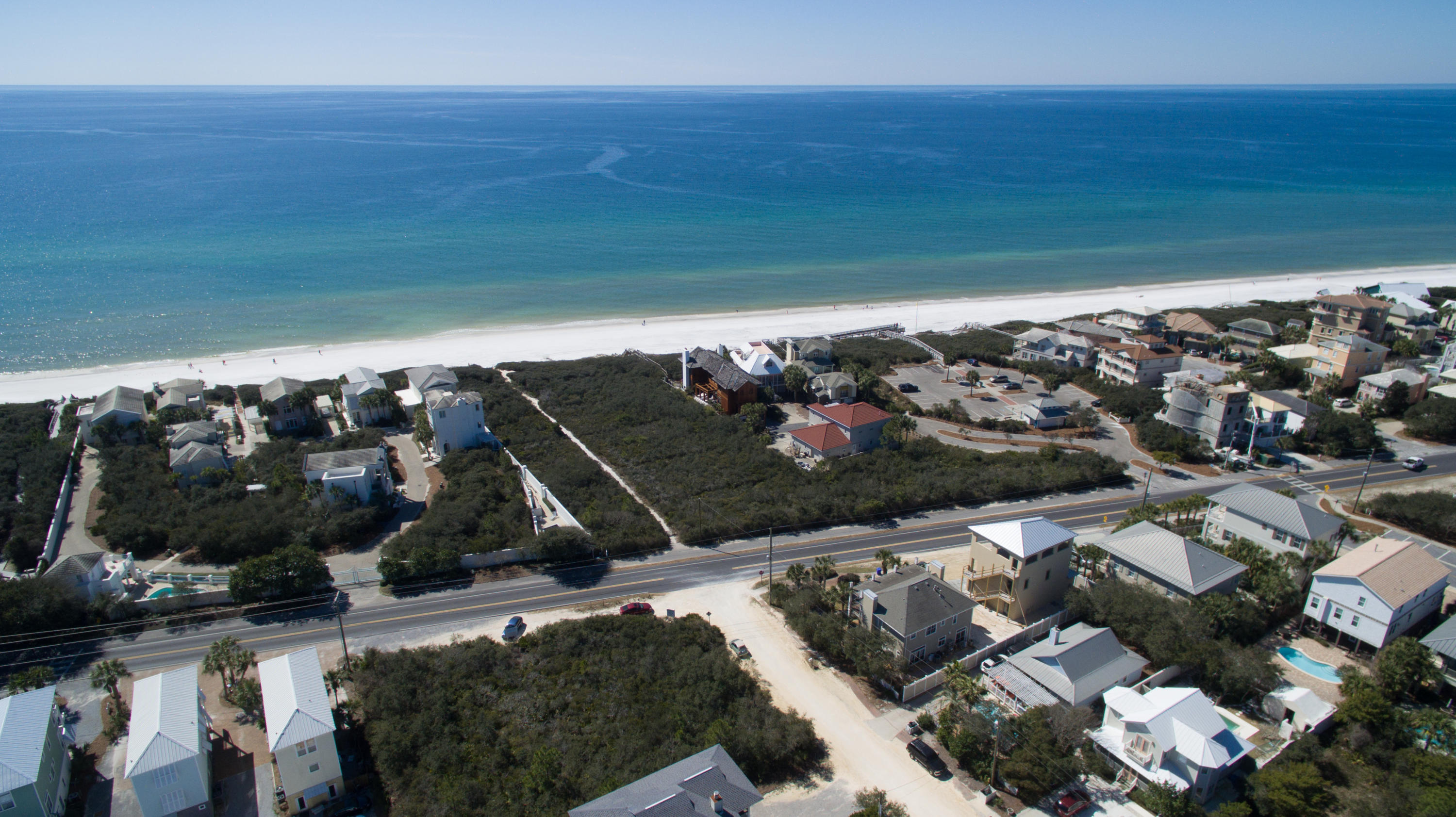 Large, Gulf view lot on 30A in Seagrove. Views are via Montigo Ave Gulf Shore Manor beach access to the south and Bramble Grove public access with restrooms, ramp and parking to the southwest. This oversized lot will easily accommodate a large home with carriage house and pool. No HOA dues or design review required.