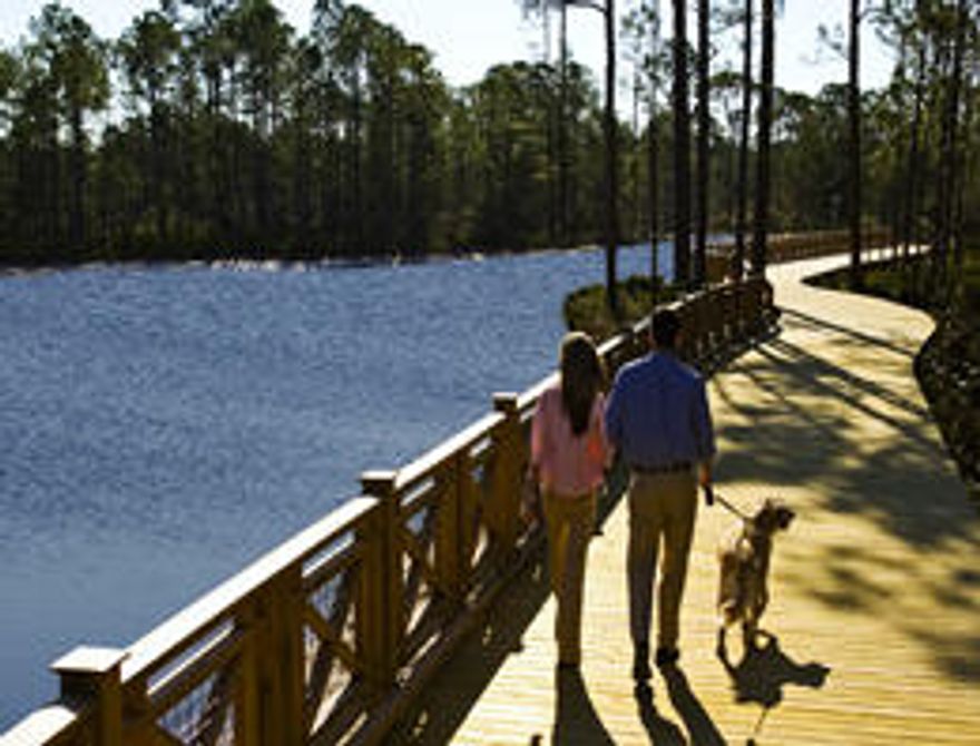 This is your opportunity to own a lot in the fabulous neighborhood of WaterSound West Beach. Build your dream home on this amazing lot with nearly all surrounding construction complete. WaterSound West Beach is a quaint community of classic coastal homes nestled on the south side of Scenic Highway 30A and bordered by both the Gulf of Mexico and Deer Lake, one of South Walton's rare coastal dune lakes. Owners in this private community enjoy an array of premium amenities including a zero-entry swimming pool with grill area and outdoor fireplace, parks and green spaces, a puttering park, winding nature trails, access to the WaterSound Beach fitness center and private beach access.