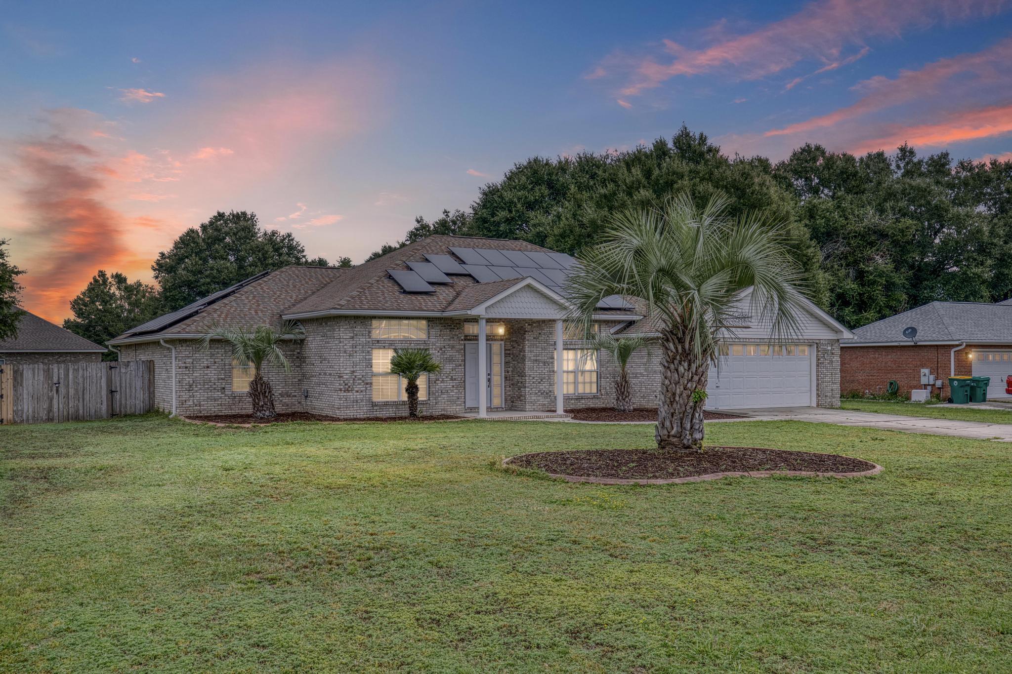 Updated 4BR/2BA home with pool, spa, and potentially no power bill or very low electric costs! Includes $50K in upgrades, including solar panels, fresh interior paint, new wood floors, new rain gutters, and smart thermostat. Kitchen features a center island, with granite countertops, and a gas stove. Enjoy a large fenced yard with a shed, well-fed sprinkler system, and new septic lines. Offered $25K under market value. Turnkey ready opportunity for your first home, your next home, or an investment property!
