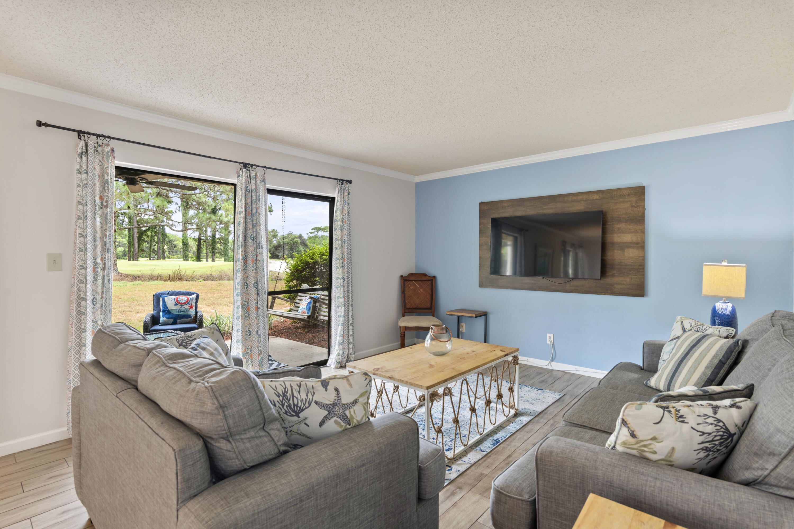 Adorable ground floor unit with excellent views of the golf course and green space. This condo is bright and airy and has many updates including new paint and patio furniture and is truly turnkey. The master bath has been updated with an oversized tile shower along with an updated kitchen. Seascape offers many amenities including access to 5 pools, tennis, pickle ball and beach access. Just minutes to the Silver Sands outlet mall with name brand shopping and Grand Boulevard with high end stores and restaurants! Seascape is also home to Moon Crush concerts year round that provide great rentals and easy access to major headliners. Enjoy the peace and quiet of this rare ground floor condo!