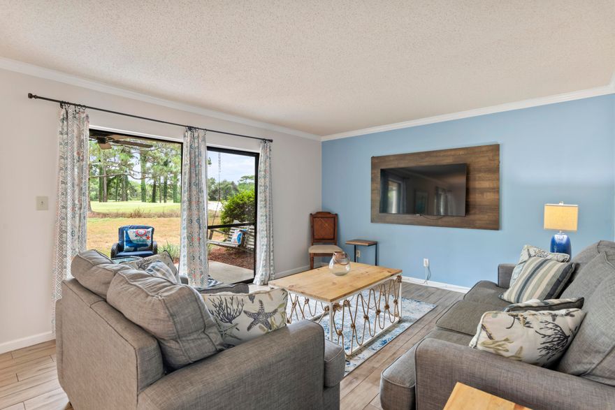 Adorable ground floor unit with excellent views of the golf course and green space. This condo is bright and airy and has many updates including new paint and patio furniture and is truly turnkey. The master bath has been updated with an oversized tile shower along with an updated kitchen. Seascape offers many amenities including access to 5 pools, tennis, pickle ball and beach access. Just minutes to the Silver Sands outlet mall with name brand shopping and Grand Boulevard with high end stores and restaurants! Seascape is also home to Moon Crush concerts year round that provide great rentals and easy access to major headliners. Enjoy the peace and quiet of this rare ground floor condo!