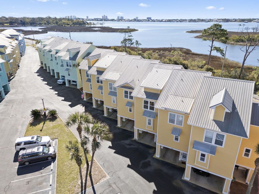 Water View Townhome - Fully Furnished & Renovated in Innerarity Townhomes!

Welcome to Innerarity Townhomes, a gated coastal community at the base of Innerarity Island, right on Perdido Bay. This fully furnished, fully renovated townhome is move-in or rental ready—just bring your bags!

Enjoy your morning coffee on one of two private balconies, watching boats pass by on the Intracoastal Waterway. This home features 2 bedrooms, 2.5 bathrooms, and 1,305 sq. ft. of living space, plus an additional 900 sq. ft. of covered outdoor area—perfect for relaxing or entertaining. 
In the last year, the entire home has been renovated from top to bottom, with wood-look tile floors, fresh paint, new kitchen appliances, new furniture, and stylish décor. The open-concept living, dining, and kitchen area flows out to a private deck overlooking Kees Bayou and the Intracoastal, offering the ideal balance of sun in the winter and shade in the summer.

Upstairs, the primary suite includes a double vanity with stone countertops and a private balcony with incredible water views. The guest bedroom and bath provide great space for family, visitors, or even a home office.

Whether you're looking for a primary residence, second home, or investment property, this community is a great fitrental estimates are available upon request. HOA dues cover lawn care, pool maintenance, and more, so you can enjoy a low-maintenance lifestyle. Residents also have access to the community pool, fitness center, and private beach, where you can relax or launch a kayak right from the shore.

When you're ready to venture out, you're just minutes from Perdido Key, Johnson's Beach, state parks, great restaurants, NAS, and more.