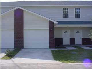 Great townhome in Niceville. 9' ceilings, tile in foyer, hall, kitchen and all baths. Solid surface countertops in kitchen with all wood cabinetry. The unit has a privacy fenced backyard, one car garage and back patio. Sorry, pets and smoking are unauthorized.