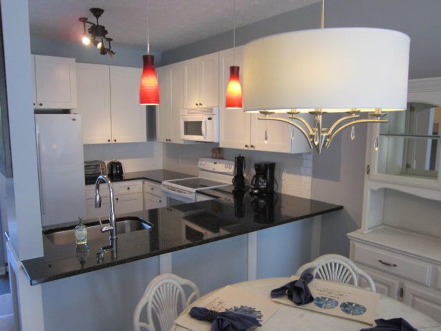 Wow! Likely the best condo value anywhere along 30-A. Just remodeled with granite everywhere, new kitchen with slate floors, new master shower with white subway tile (replaced fiberglass enclosure), new light fixtures and new paint throughout. Clever double full sized built in bunks in extra bedroom. All of this is just steps to the white sands of the Gulf and walkable to many restaurants and shops. What's more? Heron's Watch has deeded access to Eastern Lake with a dock for canoeing or kayaking to the gulf. A must see!