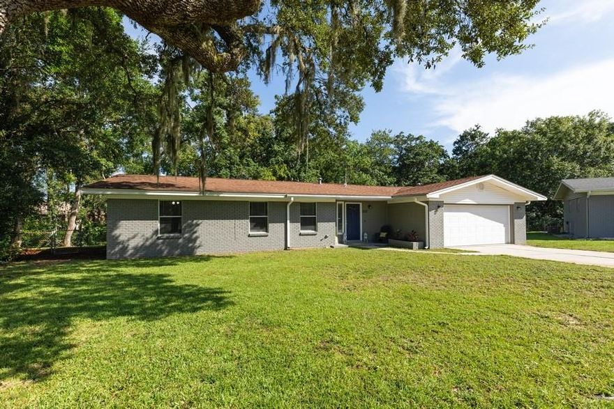 Welcome home! This charming 3 bedroom, 2 bathroom mostly brick home is located on an over-sized cul-de-sac lot in the highly sought after Northgate Estates subdivision central to both Eglin and Hurlburt AFB.  The home itself is gorgeous and newly renovated to include a light & bright kitchen with a large island and breakfast bar seating that flows directly to the large dining room featuring  a double-sided brick fireplace. A den lies opposite the dining room, lined with a multitude of windows showcasing beautiful views of the wooded creek right in your very own backyard . There is a screened in Florida room great for morning coffee or after dinner relaxation. A second living area at the front of the home is a perfect playroom for kids or a formal living area. The master bedroom features 2