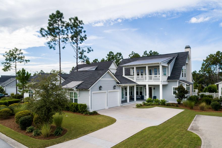 This classic coastal residence was designed for the relaxing and peaceful living that defines our renowned coastal communities.  Constructed by reputable local builder, Romair Construction, the residence offers a notably large residence and homesite within the desirable community of Watersound Origins.  The spacious floor plan presents a bright and open layout, providing an inviting living space with an abundant flow of natural light and generous space dedicated to the tranquil outdoor living area. Enjoy morning coffee on the screened back porch and entertaining and gathering with family and friends around the large private pool deck, complete with outdoor shower and fire place with additional sitting area for year-round social enjoyment. The exceptional kitchen features a charming breakfast nook, pantry, and large center island opening into a stunning great room with a fire place. This thoughtfully designed coastal home offers plenty of space for family and guests. The second floor living area creates an additional retreat for family gatherings or everyday living.  The Watersound Origins community is a family-friendly neighborhood with exceptional amenities! As part of the amenity fee, homeowners have access to the Village Commons Pool & Fitness Center, Lake Powell Dock, and golfing.  Discover the idyllic coastal lifestyle of Watersound Origins.