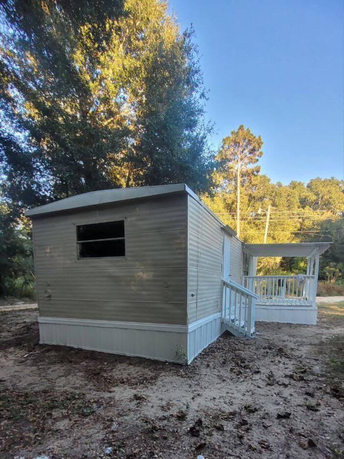 Newly remodeled 3 bedroom mobile home in a quiet park.  Large covered front porch.Rent includes water and trash. Washer and dryer hookups in the unit.