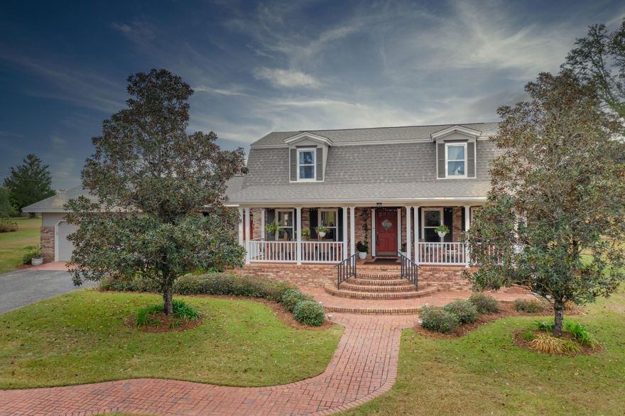 SELLER TAKING BACKUP OFFERS.This is the beautiful home and 19 acres you've driven by and admired for years! The breathtaking tree lined paved driveway guides you to your new home in the country, but just close enough to the city. The impressive sized front porch might make you wish you had a glass of sweet tea/etc. and a book to relax with. Enter the foyer area to be impressed with all in site. Your new wood floors will lead you to the right side which is the Boar's Den, aka, the den. To the left is the gorgeous dining room that adjoins the remodeled kitchen. Between the two rooms you are awarded an eat-in bar with storage galore, topped with granite counters, and probably has enough seating area for all your best friends for a fun night of entertaining. Move into the Princess Parlor, aka, the living room, to cozy up to the hearty fireplace and views of your glorious land. Off the parlor you have an oversized laundry room with office space, an abundance of storage, and a full bath. Across the way you will find the first master bedroom next to the full bath that includes a new glass enclosed shower/bath combo. Feel royal with bidets in all the bathrooms. Upstairs is impressive with 3 bedrooms and a full bathroom. One of the bedrooms is a second master suite with a full bath that includes a separate guest entrance (unless you lock that door). Also has an attached vanity room. Here's some of the new items: Roof 2019, one of the two HVAC units 2018, windows 2016, downstairs remodel 2014, exterior paint 2017, microwave 2016, glass tub/shower enclosure in downstairs master bath 2017, weather stripping on all doors 2020, porch ceiling fans 2018, wrought iron rails on front porches, and irrigation system updated 2017. Bonus features: back entertainment patio area that spans almost the entire length of the home, termite bond in place, pole barn, garden spot with electric fence, chicken coop (you might negotiate some chickens), 2 car garage, and a very impressive barn with an attached but separate cooled summer kitchen and living room area. The location is perfect as the home is within 2.5 miles to the hospital, shopping, dining, and schools, around 5 miles to Falling Waters State Park which is home of Florida's tallest waterfall, and within around an hour to the international airport and the sugar white beaches of the Gulf Coast. Call...don't let someone else take your home!