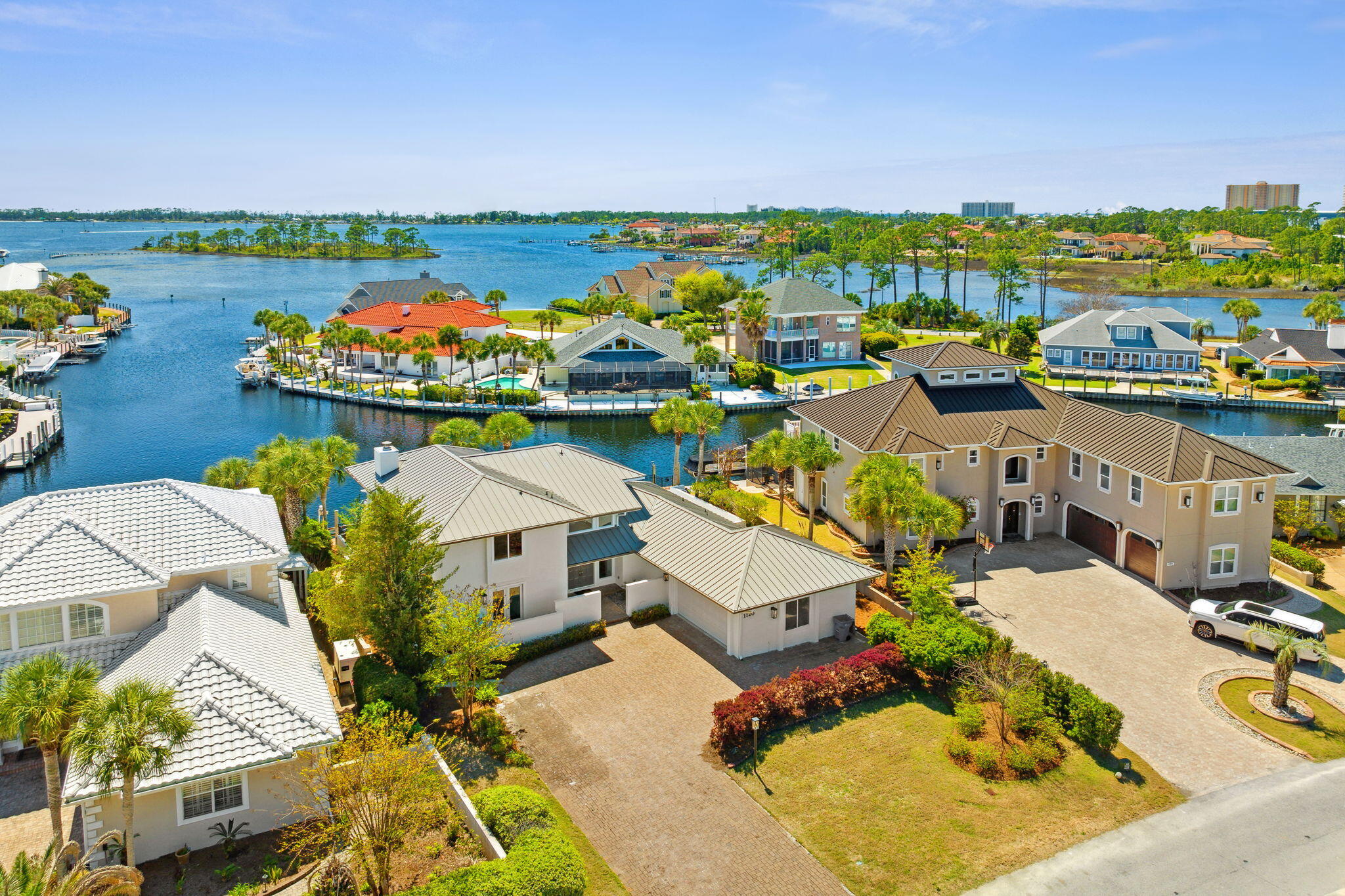 This is the home you've been waiting for.  Imagine parking your yacht right behind your home!  No more driving to the marina.  No more paying for dockage.  95 ft of deep waterfront footage and a straight shot to the bay.  Stunning, unobstructed bay views from almost every room.  Located in the highly sought after community of Bay Point and completely remodeled, you'll be impressed by this 3 bedroom, 3 1/2 bath home.  Inside you'll enjoy the beautiful windows allowing lots of light.  Spacious kitchen with lots of cabinets, island, recipe desk, pantry, and breakfast area.  Enjoy dinner in your waterfront dining room.  Living room features separate reading or piano area and wet bar.  Downstairs also has a spacious bedroom and private bathroom.  Head upstairs to relax in your waterfront master