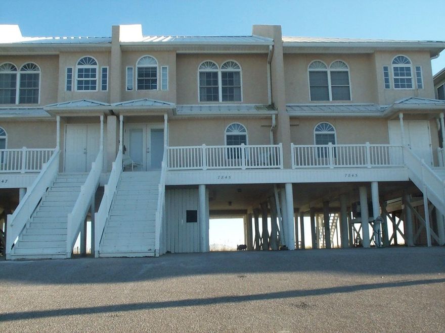 STOP! ... Entering into this BEACHFRONT Gulf of Mexico home will knock your socks off and take your breath away with water views from every room... Completely furnished. Just bring your swim wear... Huge Kitchen with a breakfast bar that can seat 5 easily and it adjoins the very large living room and dining area...Huge deck off from LR is vinyl material and a large area for entertaining. Steps from deck lead out to boardwalk to the Gulf.. Master BR & BR #2 also have vinyl decks facing the Gulf... Upstairs loft area is a sleeping area. With pull out sofa bed, this unit can sleep 11... Ceiling is knotty pine thru out for a beachy touch. Kitchen appliances are stainless. Countertop is solid surface ''silestone''.. Covered parking. Storage area for your beach gear.. Ext. Shower stall.