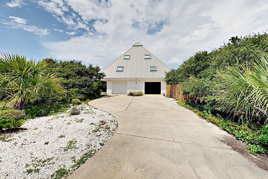 Investor Alert! Priced BELOW recent appraisal! AMAZING LOCATION in popular Blue Mountain Beach on 30A! Live in a pyramid across from the beach with Gulf views! Nestled between the Gulf of Mexico and Big Redfish Lake, this fully furnished unique 3 bedroom home with 3 car garage & fenced yard has rental income potential or could be torn down to build your dream home.Just steps from the beach access, the Pyramid home features a large garage with additional storage, full laundry room & half bath and plenty of storage space on the ground level floor. Head upstairs to the second floor to find an open great room with dining area and galley kitchen with a large deck. There are also 2 bedrooms and a bathroom on this level along with a convenient laundry chute. The entire 3rd floor comprises the