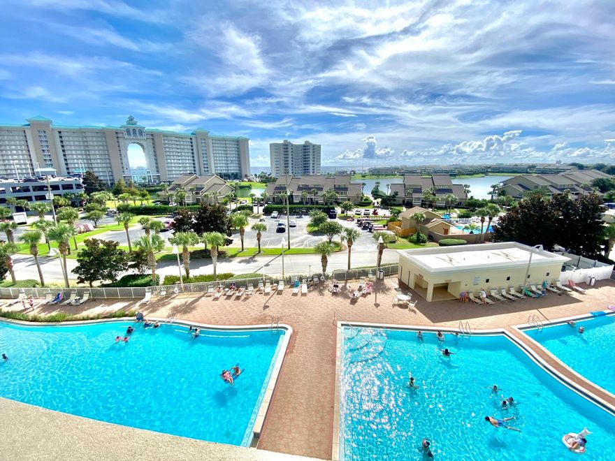 Not too high, not too low, this 5th floor Ariel Dunes II 506 condo is just right and ready for a new owner! Featuring a fully equipped kitchen, wide living room w/floor to ceiling glass doors w/expansive views of Gulf, lake, pools; bonus hallway bunks, full bath with washer/dryer & hallway access and adjoining another half bath accessed fr MBR. Great floorplan for those starting in rental real estate or just want a getaway! Sleeps 6. Rents projected to $45K/yr. Grand lobby leads to pool & grill areas; fitness room, Cabana Cafe/WhalesTail dining; Seascape amenities include beach access, entertainment, restaurants, world class golf, tennis, gated entry, shopping center on N end of resort and so much to enjoy. In heart of popular Miramar Beach! Owner can make a flooring allowance..