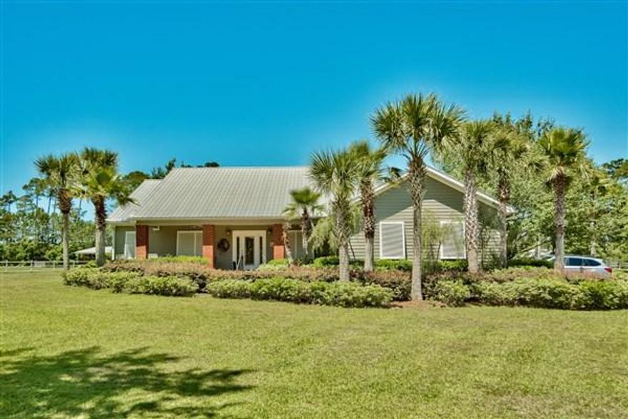 ACT NOW. Short Sale. Looking for a wonderful Home w/complete privacy on 8.9 acres on a creek w/Jet Ski access to the Bay all within 15 min from Niceville & 25 min from the Beach? You've found it. This one of a kind Equestrian home has it all! Live the tranquil life you've always dreamed of. Consisting of a 2593 SF main residence, 1560 SF guest home, gorgeous pool & spa & stable w/ 5 stalls, you've got everything you need.The main house features beautiful wood looking Herringbone tiled floors, spacious kitchen w/granite counters & large eating bar, two dining areas & large stone fireplace in the living room.The large guest house w/high ceiling & large industrial automatic door is ideal for multiple cars, boats, recreational space, media room  or exercise space. Custom cabinetry w/room for a small refrigerator  could easily be expanded to a full Kitchen and a separate bedroom with a gorgeous en-suite full bathroom completes the living space.  

the private, walled, courtyard between the two homes is a dream entertaining space with 40x10 salt water, heated, gunite lap pool, spa and huge covered outdoor living area and kitchen.

Other features of this home 5 automatic waterers in stalls, air conditioned tack & feed room, separate hay room, multi-zone sprinkler system &  gated entry, 

Although home is located on a creek which adjoins the Bay, any water vehicle needs to clear a VERY LOW bridge.   Consequently, property can only accommodate a Kayak, row boat or LOW profile Jet Ski.  Anything larger could be housed at the nearby Marina. 

Located just 15 min from the Mid Bay bridge to Destin restaurants & shopping  & less than 10 min from the new Publix in Freeport, enjoy a tranquil, peaceful setting. Come see this wonderful home today! Buyer to verify water depth, jet Boat & Ski access and any other information they deem important.