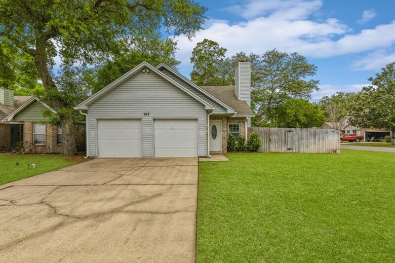 Fantastic two story home in Bluewater Bay, situated on a corner lot with a privacy fenced backyard this home is a must see. Open floor plan with a remodeled kitchen, master bedroom downstairs and two additional bedrooms upstairs. Wood flooring throughout the first floor, vaulted ceilings and plantation shutters are just a few of the updrades this home boast. The two car garage has an enclosed 120 square foot workout space on one side that is heated and cooled (not included in home square footage). New roof being installed before closing!