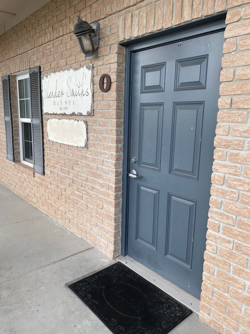 2nd floor office unit. Superior construction - structural steel with brick and standing seam metal roof. This executive office space offers an upscale feel with 5 spacious private offices, a reception area, a kitchenette/break area, and a restroom. This office space is also hardwired in each room for data, cable, and phone lines, making it turn key. Located in a high traffic location and centrally located for maximum convenience, this commercial office space also features an elevator, exterior signage and ample lighted parking.