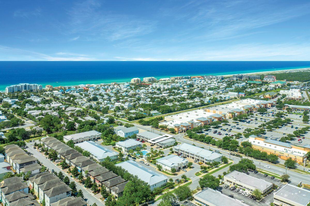 Off the beaten path but in the middle of everything is this three-bed, two-and-a-half-bath townhome located just off Crystal Beach Drive in Destin. Boasting nearly 2,000 square feet of living space, this well-maintained residence is outfitted with neutral floors and paint and delightful beach decor. The reverse floor plan places two large bedrooms with a shared bath on the first floor of the townhome, accessible via a spacious foyer. Take the stairs to the second floor and you'll find an open living room, dining area and kitchen with stainless appliances and, at the rear of the unit, the owner's retreat with en suite bath and walk-in closet. A spacious balcony can be accessed from the living area, providing a relaxing venue for unwinding that overlooks the community pool. Green space off