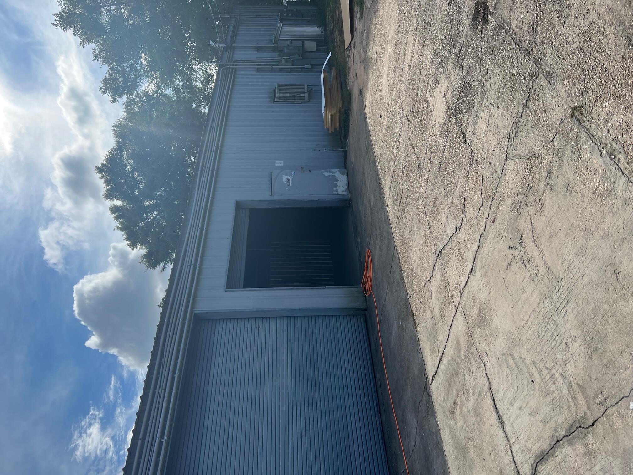 Warehouse space with bathroom, two roll up doors and some yard space included. No auto repair or paint/body repair.