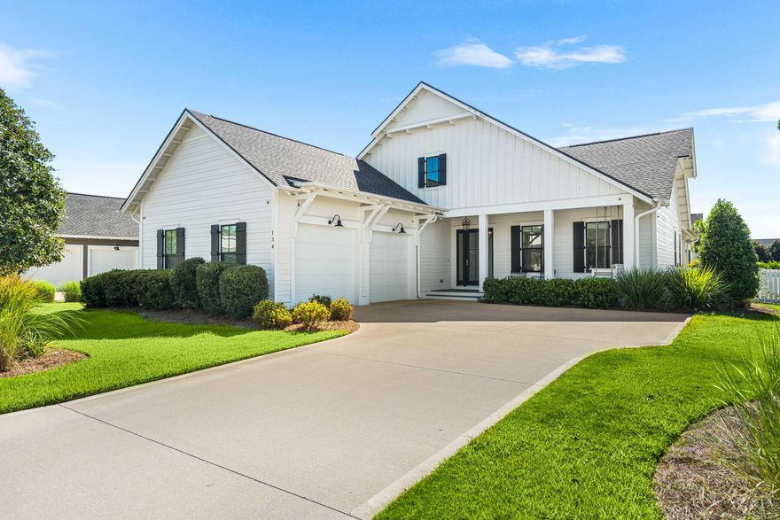 Discover unparalleled style and comfort in this one-story residence, located on a coveted corner homesite adjacent to dedicated green space. This beautifully designed home features 4 bedrooms, 3.5 baths, and over 2,600 square feet of coastal living. The highly sought-after open layout includes a spacious living area with a multitude of windows that flood the space with natural light. The interior is a masterpiece of modern luxury, showcasing premium upgrades like Medallion wood flooring, quartz countertops, and the convenience of motorized blinds and drapes throughout. The gourmet kitchen is a chef's dream, equipped with a Wolf dual fuel range, a Sub-Zero refrigerator, glass-door stacked cabinets, and under-cabinet lighting. Relax and entertain on the screened porch, complete with a built-in gas fireplace for year-round enjoyment.

Nestled within the premier Watersound Origins community, this home offers both privacy and an exceptional lifestyle. Enjoy access to the Village Commons pools and fitness center, tennis and pickleball courts, miles of nature trails, and Lake Powell. The community is just minutes from the beaches of 30A and the shopping and dining at the Watersound Town Center. Don't miss the chance to own this coastal retreatschedule your private viewing today!