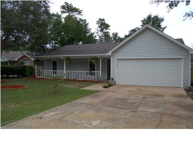 VERY MOTIVATED SELLER!! Sparkling, remodeled and better than new. If you have seen this home before, wait until you see it now!! The owner has taken time and put lots of love into upgrading this wonderful home. Featuring 20'' ceramic tile in the entry, halls, main living area and kitchen and capped with Victorian base boards, new paint throughout, and new carpet in the bedrooms, this home just glistens. The owner didn't stop there though, the kitchen offers new counter tops, a rolling center island, refinished cabinets with new hardware and beautiful new light fixtures to finish it off. This home also boasts an upgraded fireplace with new gas logs, a brand new gas hot water heater and hurricane rated windows. The list goes on and on!! All the work in the lovely home has been done for
