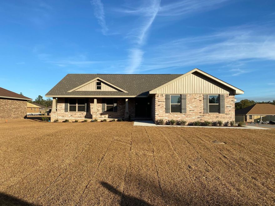 This plan is 1920 sq ft with 4/2 on corner lot with side entry 2 car garage!This home has spacious great room with open concept to dining room and kitchen. Kitchen features beautiful granite counter tops and antique white cabinetry.Flooring is upgraded throughout with carpet in bedrooms only. Some other upgrades include raised hearth fireplace, separate shower and garden tub in master bath, and floodlights on both corners of the home! This is a gorgeous Craftsman style home with an upgraded 14x16 covered rear porch.Exterior is all brick. Front and back comes fully sodded with irrigation system to keep it green!Come see, you wont be disappointed. Willow Creek Plantation is a lovely subdivision.