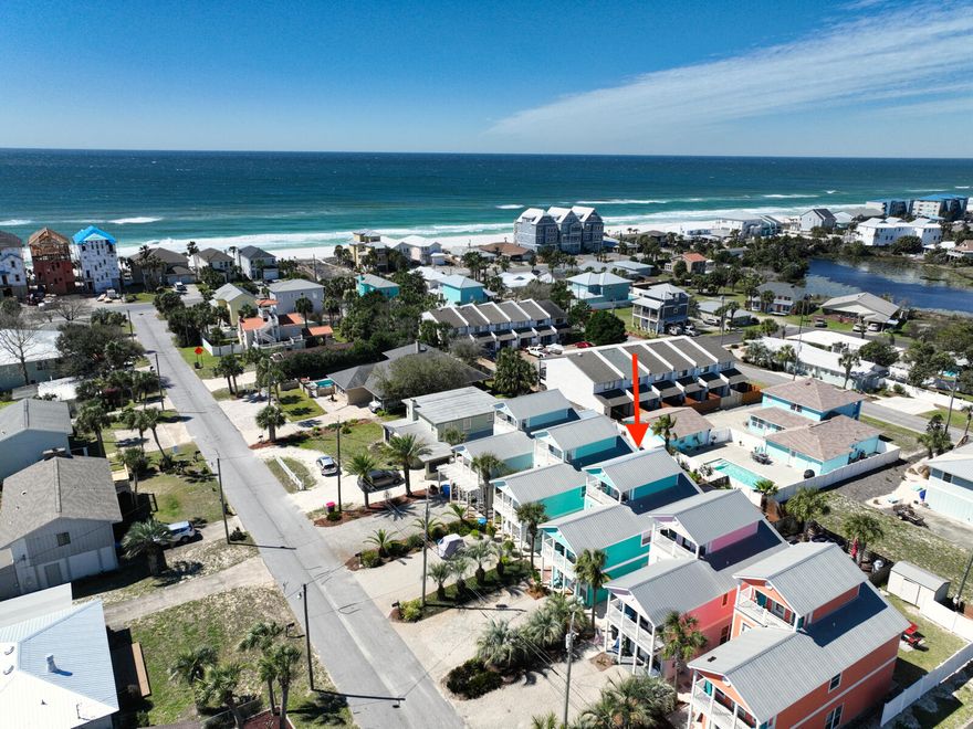 Priced to move and ready to sell! Only 600 feet to beach access and a private, heated, and screened-in pool!  With No HOA, it would make a perfect primary/second home or vacation rental investment ~ This turn-key 4 bed (can use the loft as a 5th bedroom), 3 bath home conveys fully furnished and offers a full range of updates including new smart TVs, fresh paint throughout, new Nest and keyless entry system, new exterior cameras, updated light fixtures, new window treatments, and much, much more! It is currently being used as a vacation rental with limited showing availability due to the packed rental schedule for the summer, so call today to schedule showing!!!