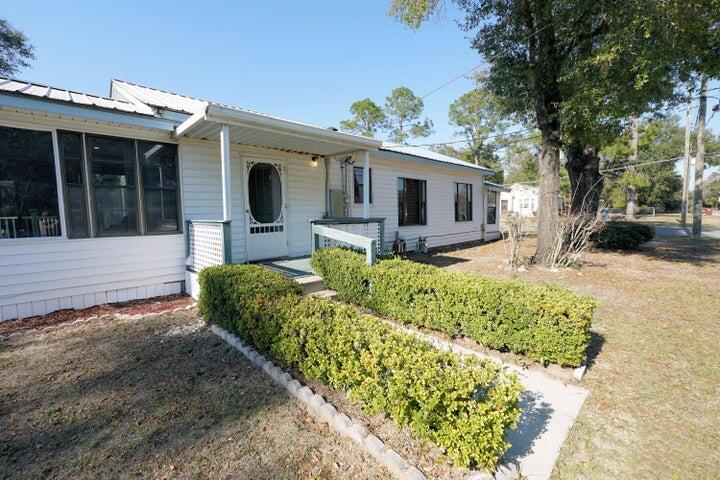 Perfect for a home business! Live in one side and run your own business out of the other! The home needs some updating but is priced to reflect that. Also the seller is offering $5000 concessions to the buyer for anything they would like to use if for. The lot is a very spacious 1/3 acre corner lot, just steps away from hwy 90 and Ferdon Blvd. Motivated sellers so bring us an offer!