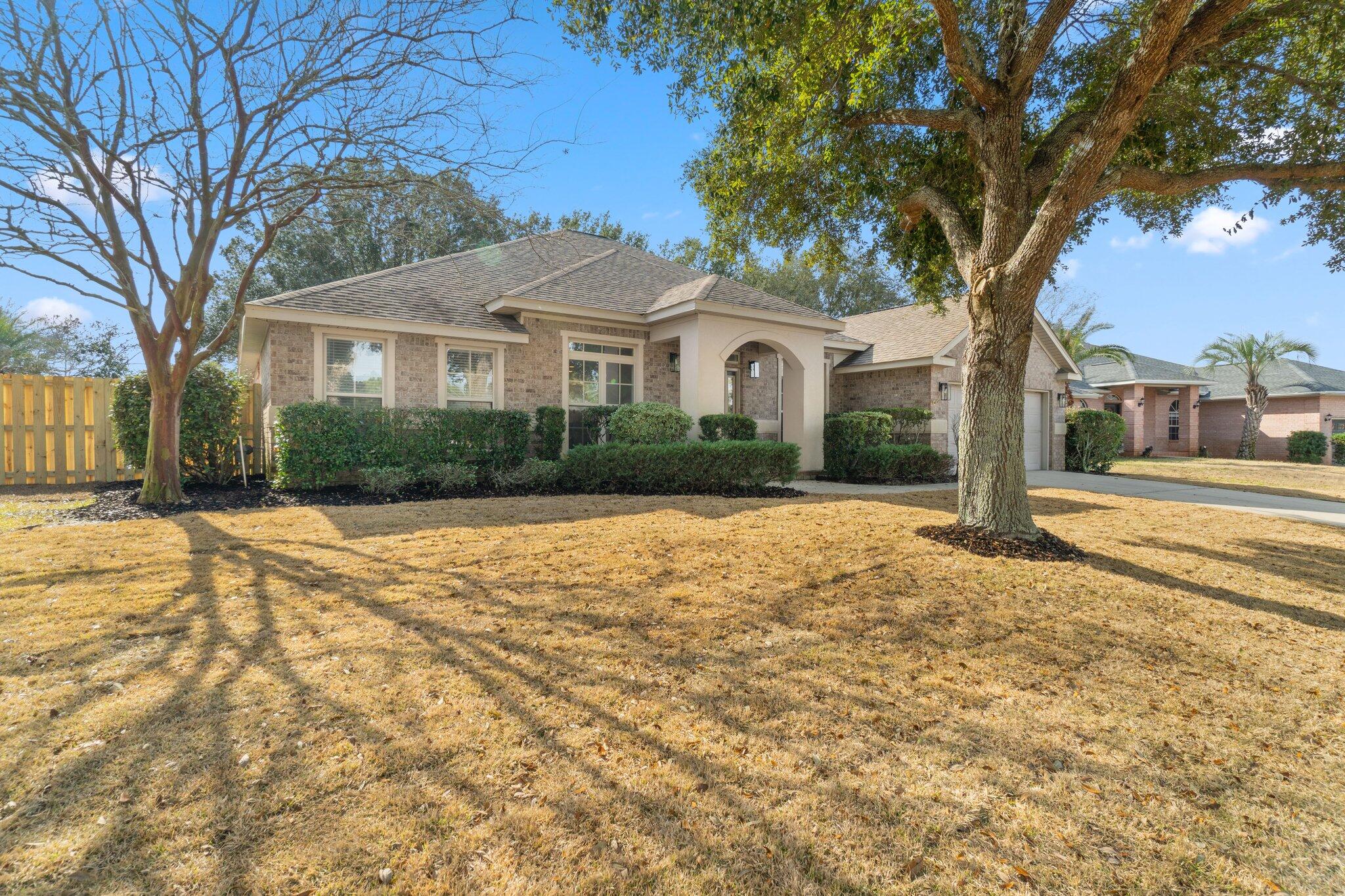 Welcome to this stunning 4 bedroom, 3 bathroom home that is sure to impress! As you enter the property, you will be greeted by a spacious and inviting living room that is perfect for entertaining guests or relaxing with your family. The kitchen is a chef's dream, with high-end appliances, beautiful countertops, and ample storage space.The bedrooms are generously sized and offer plenty of natural light, making them cozy and comfortable spaces to retreat to after a long day. Outside, the backyard is a private oasis that is perfect for outdoor gatherings and activities. The large patio area is ideal for barbecuing or enjoying a cup of coffee in the morning, while the lush green lawn