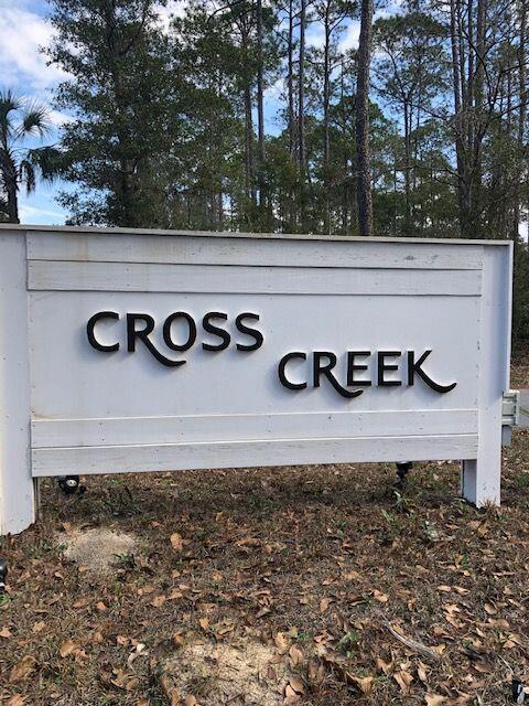 BRING US YOUR OFFER! Best price in neighborhood!!! Here is your chance to pick up your little 'Piece of Paradise'!  Beautiful up and coming neighborhood. Wonderful homesite awaiting its new owner. Approx .49 acre wooded lot. Build your Dream Home here! A few homes have been built so far. Feels like you are in the country but close to all you will need. No HOA fees. You will have Beautiful Water Views with a 2 story home. Easy access to Destin and Blue Water Bay. Take a look today! Please have your offer accompanied by your loan letter or POF. Thanks!
