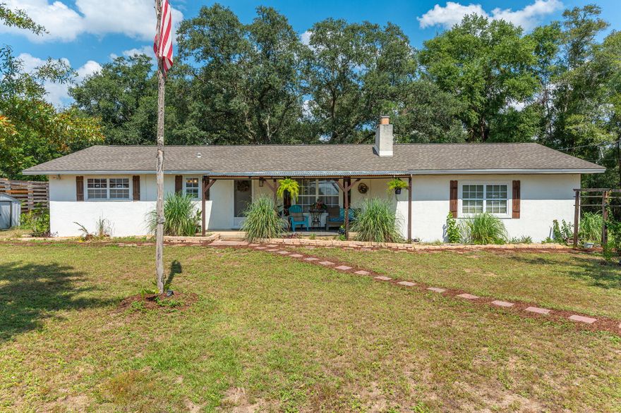 Welcome to your own homestead!  Bring the animals...this charming 3-Bedroom, 2 bath home sits on 3.02 acres and is in SOUTH Crestview! Offering the perfect escape from work with endless possibilities. Enjoy modern touches inside the home with kitchen appliances less than a year old. This house also offers an additional room for an office. Entertain guests or unwind in your backyard retreat, complete with gazebo, fire pit, garden, and RV hook-up. There are 2 sheds for all your outdoor gear.Property also features a chicken coup, handmade goat milking stand, and a versatile animal shelter, making it perfect for hobbyists and animal lovers.  Recent updates include a new water tank for well, a new septic system, and an updated drain field.
