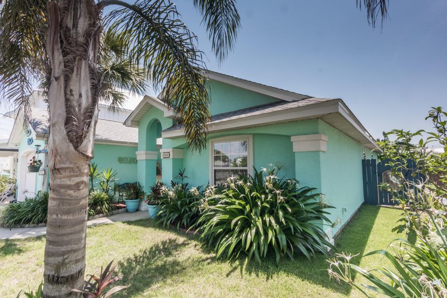 OVER The TOP Beach House WITH A POOL ! 3 Bedrooms and 2 Baths. Bedrooms have Newer LVP Flooring . Nice Tile in Kitchen ,Dining Room ,Den and Bathrooms . Plus a Larger 1 Car Garage ( Garage and a Half ) and all of this is only 3 Blocks to Bid a Wee Dedicated Beach where you have Coded Beach Access .Covered Patio as you Walk out The Back to Your Pool .This Back yard was Made for Entertaining Lot is 144 Deep. So think of Hot Summer Days with a WOW Factor . Plenty of Storage and Tiki Bar &, Changing Area. The Landscaping is just Beautiful !!! Back Yard also has a ''She Shed'' a ''He Shed'','' Cookout, Smoker Shed'' Oh and Leaving The Golf Cart